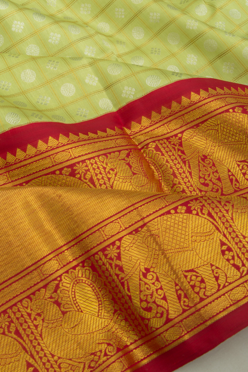 Kanchipuram Silk Checks And Butta Green Saree