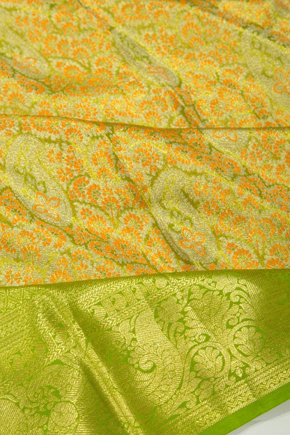 Taranga Kanchi Silk Tissue Brocade Green Saree