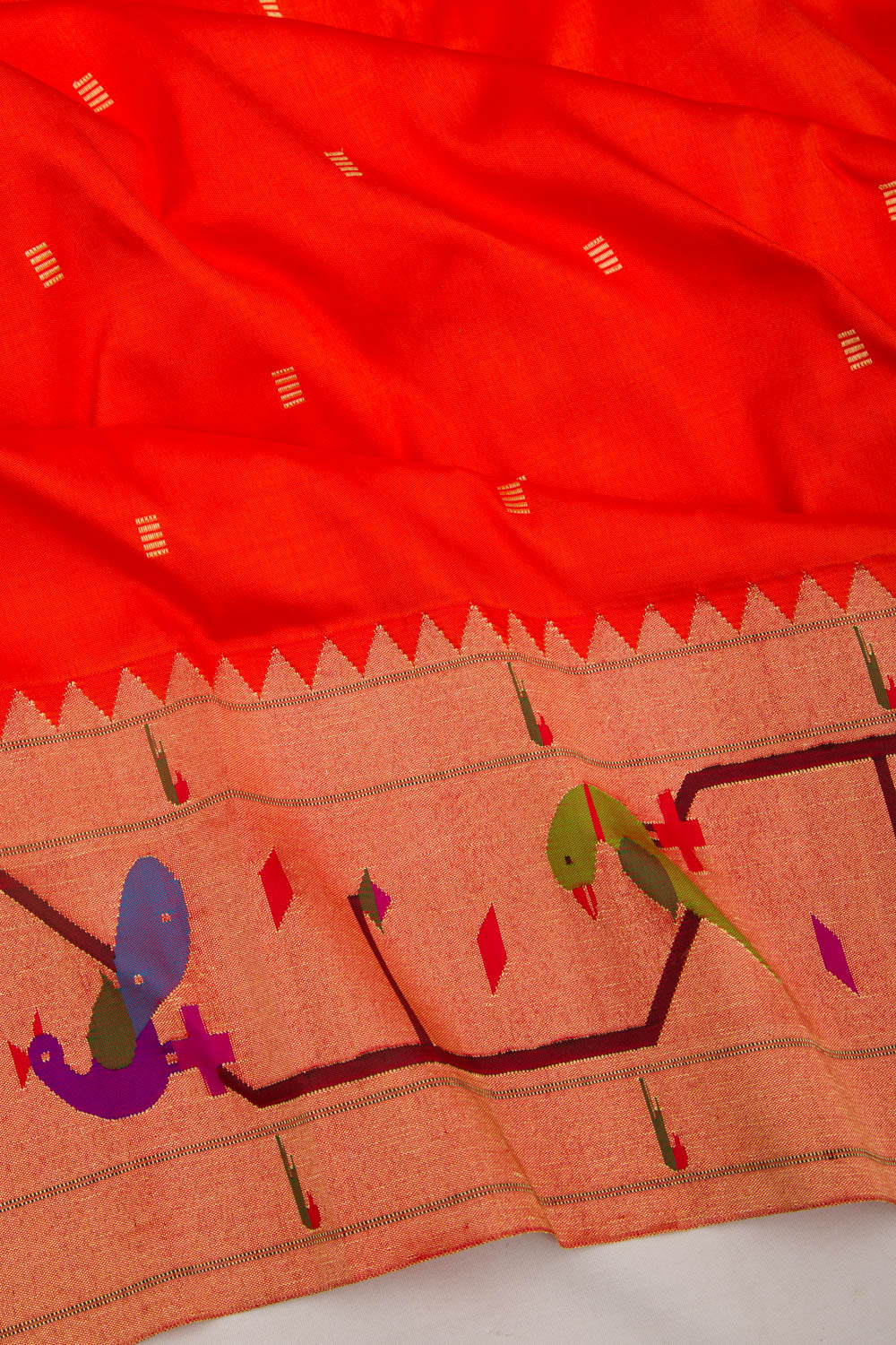 Paithani Silk Butta Orange Saree With Akruthi Border