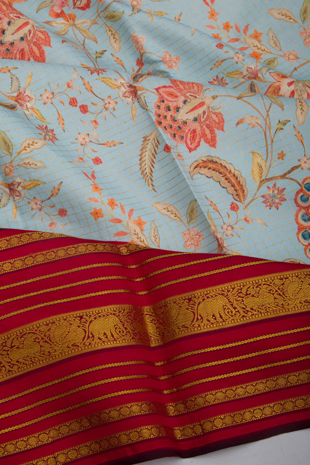 Kanchipuram Silk Checks and Floral Printed Pastel Blue Saree