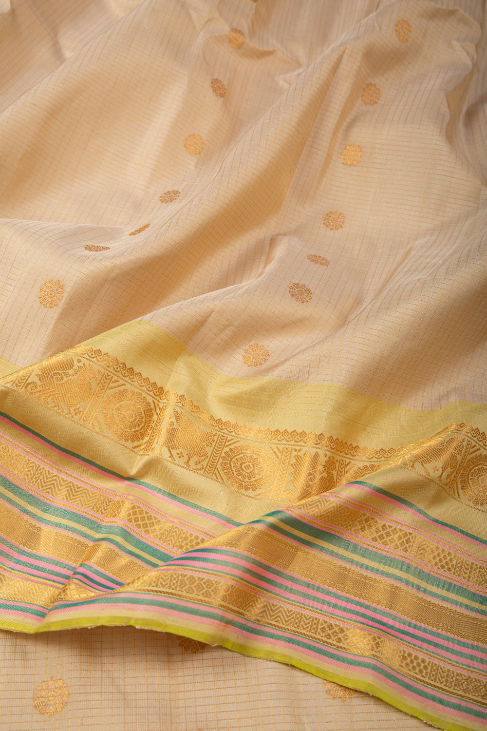 Gadwal Silk Checks And Butta Cream Saree