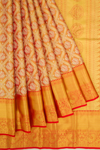 Taranga Kanchi Silk Tissue Criss Cross Checks And Butta Orange Saree