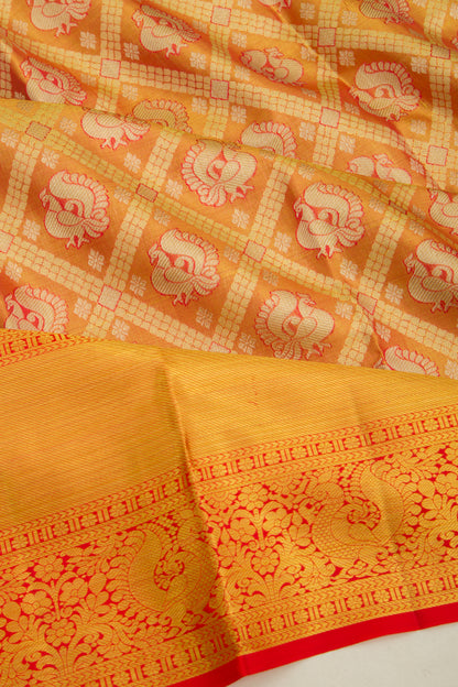 Taranga Kanchi Silk Tissue Criss Cross Checks And Butta Orange Saree