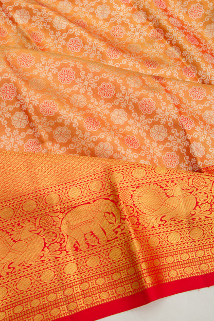 Taranga Kanchi Silk Tissue Brocade Orange Saree