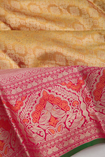 Taranga Kanchi Silk Tissue Brocade Gold Saree