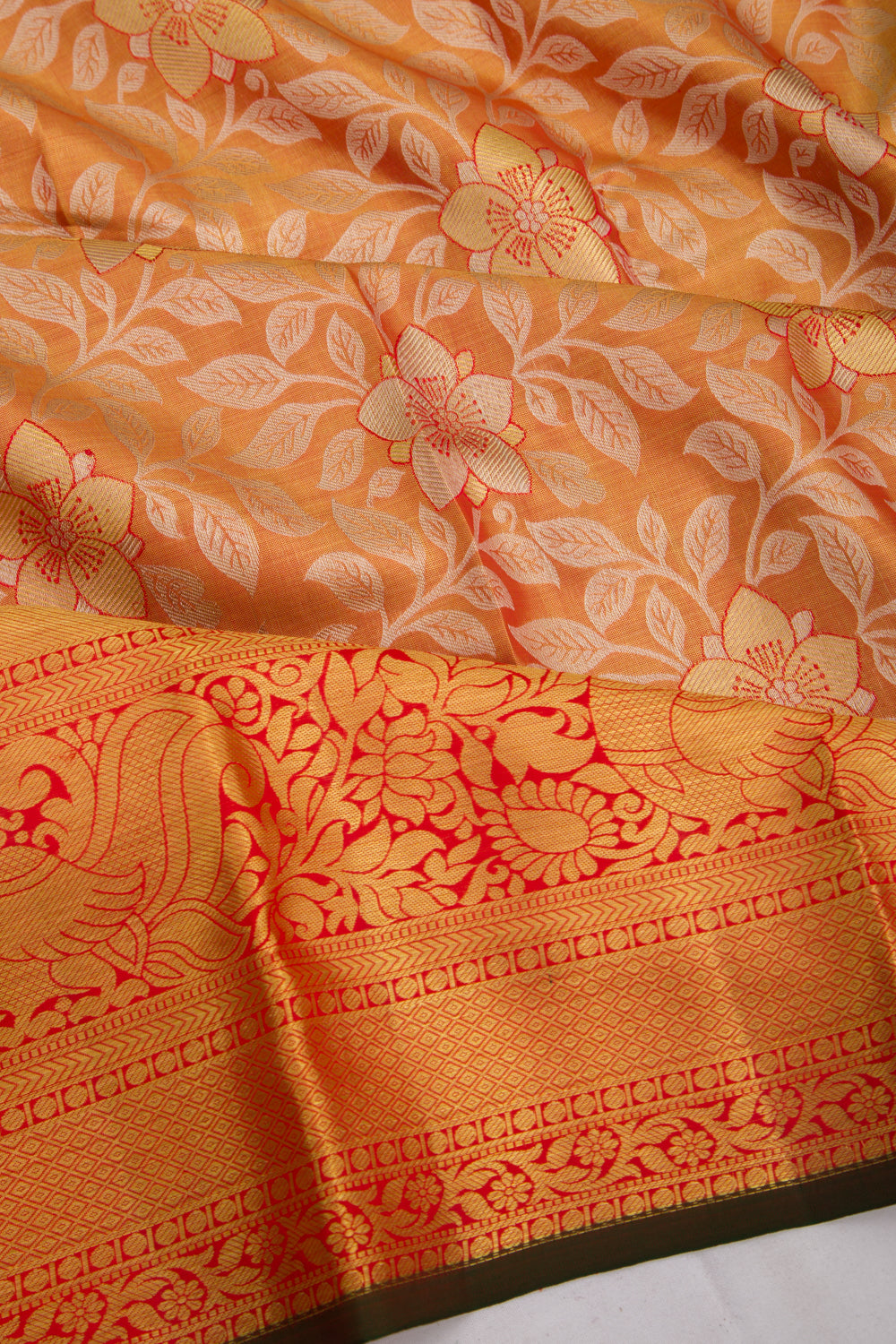 Taranga Kanchi Silk Tissue Jaal Orange Saree