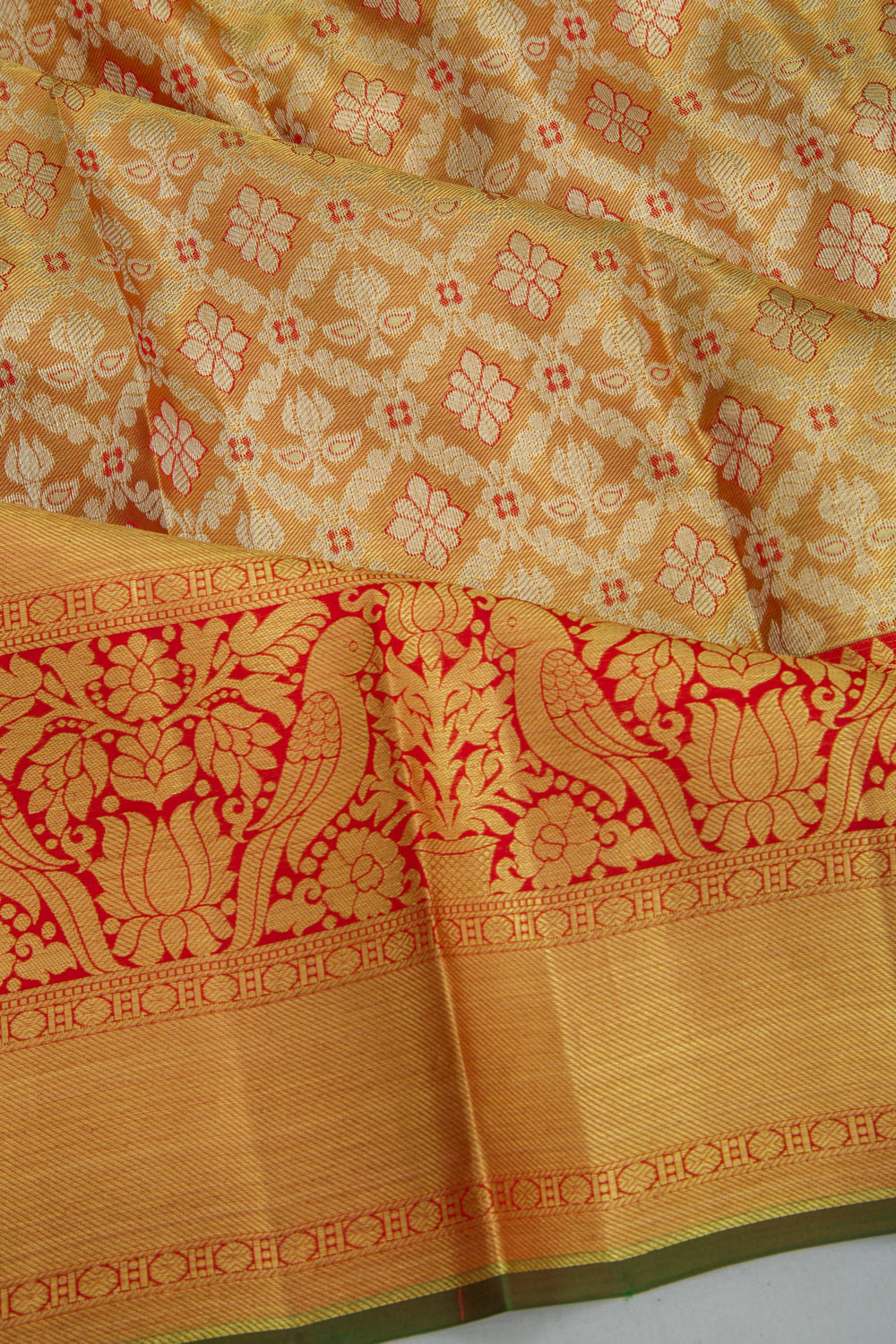 Taranga Kanchi Silk Tissue Brocade Orange Saree