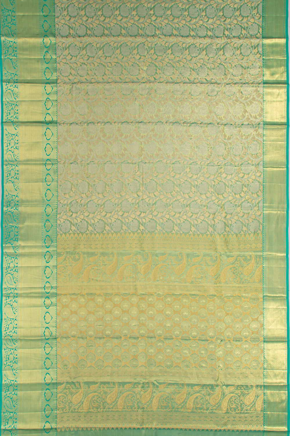 Taranga Kanchi Silk Tissue Jaal Green Saree