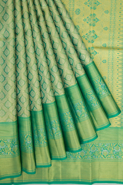 Taranga Kanchi Silk Tissue Brocade Green Saree