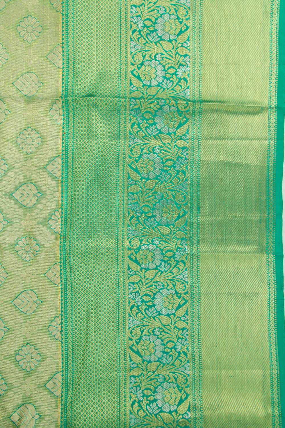 Taranga Kanchi Silk Tissue Brocade Green Saree