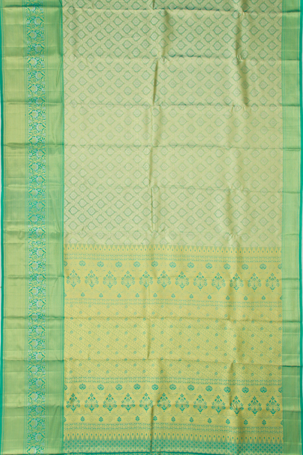 Taranga Kanchi Silk Tissue Brocade Green Saree