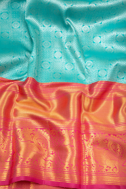 Kanchipuram Silk Checks And Butta Sky Blue Saree DM
