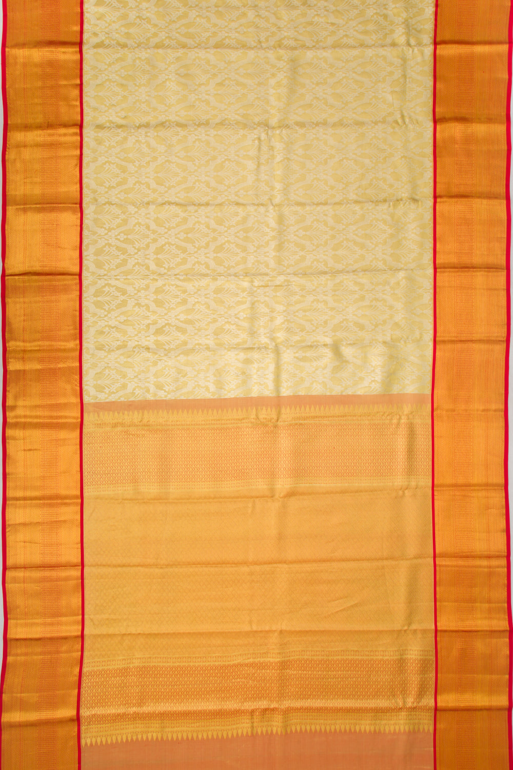 Taranga Kanchi Silk Tissue Brocade Gold Saree