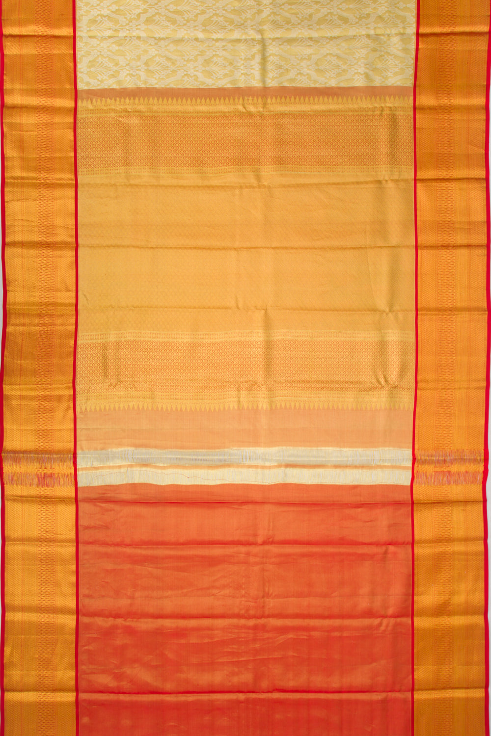 Taranga Kanchi Silk Tissue Brocade Gold Saree