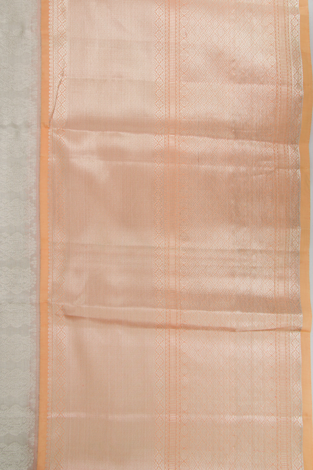 Taranga Kanchi Silk Tissue Brocade Silver Saree
