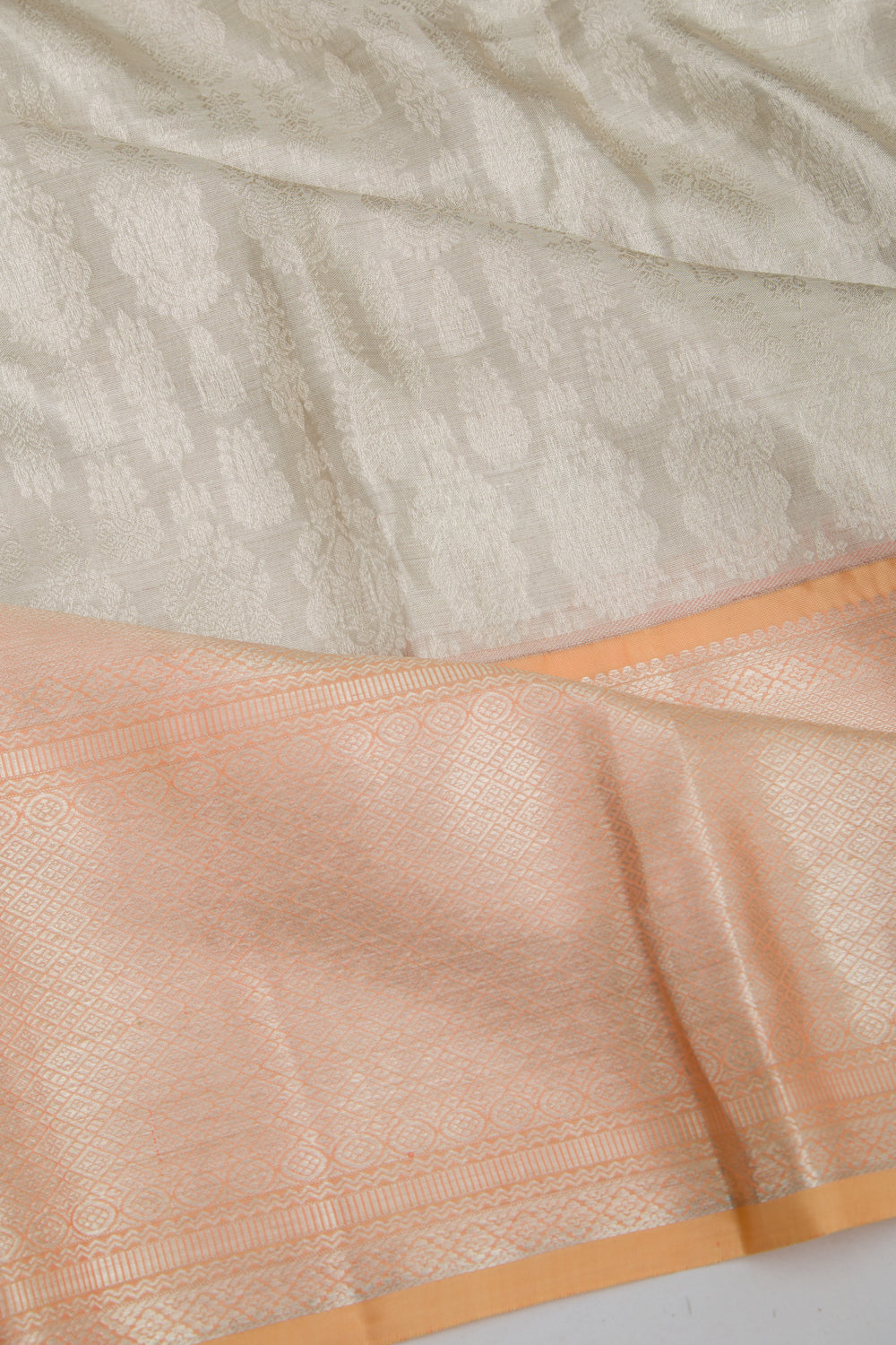 Taranga Kanchi Silk Tissue Brocade Silver Saree