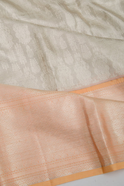 Taranga Kanchi Silk Tissue Brocade Silver Saree