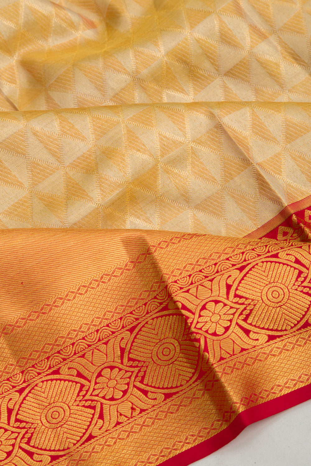 Taranga Kanchi Silk Tissue Brocade Gold Saree