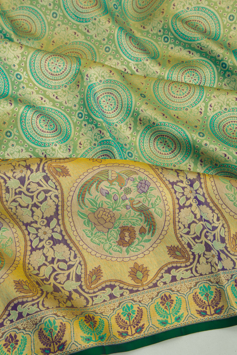 Taranga Kanchi Silk Tissue Brocade Green Saree