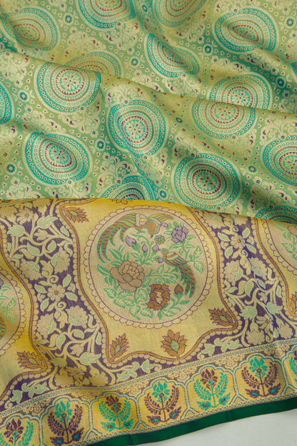 Taranga Kanchi Silk Tissue Brocade Green Saree