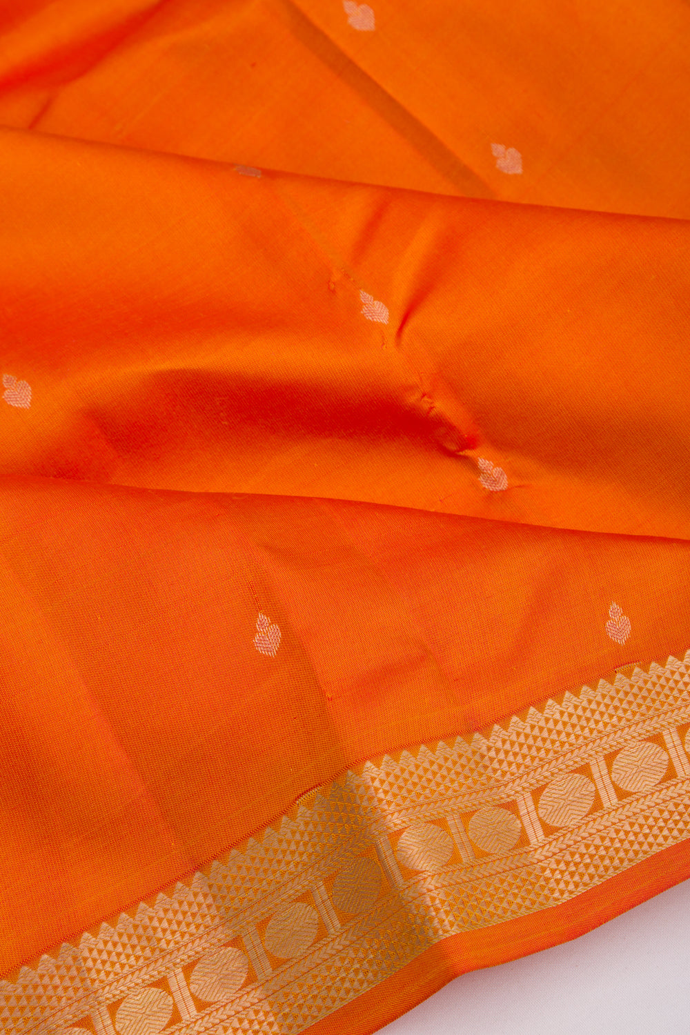 Taranga Kanchi Silk Butta Orange Saree