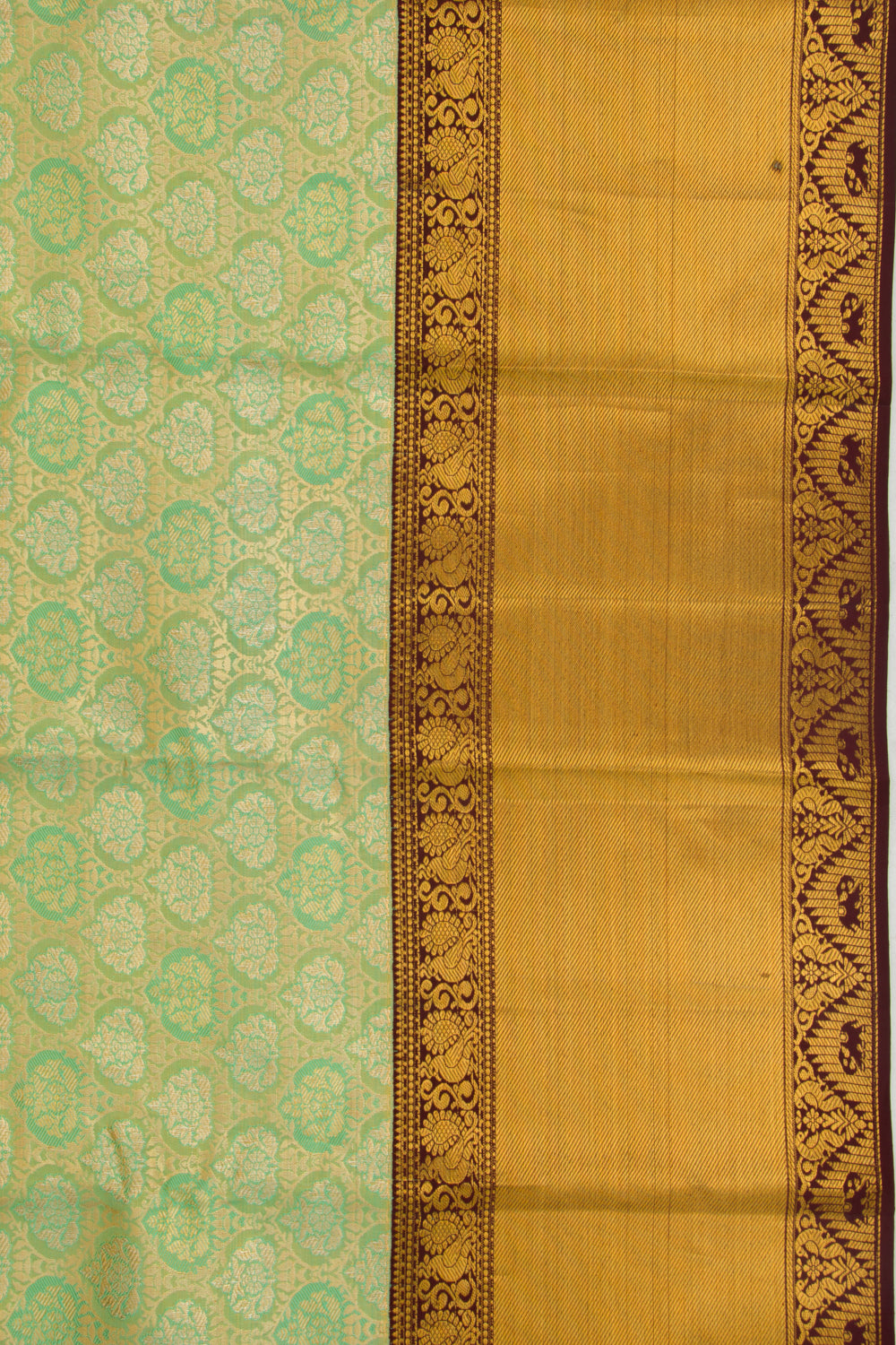 Taranga Kanchi Silk Tissue Brocade Green Saree