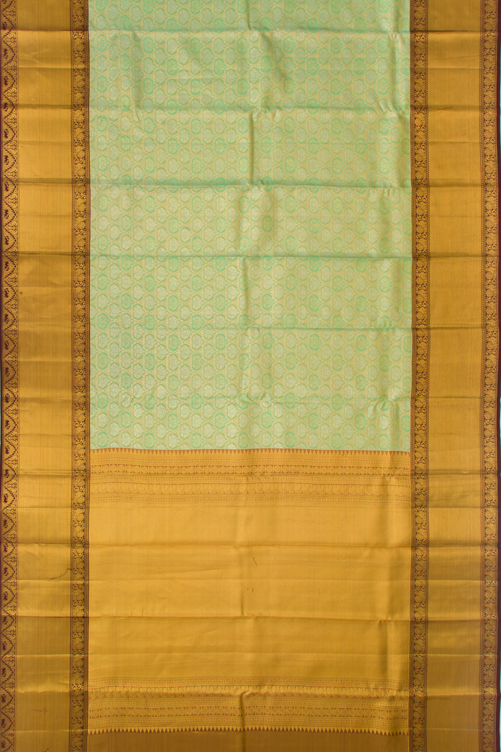 Taranga Kanchi Silk Tissue Brocade Green Saree