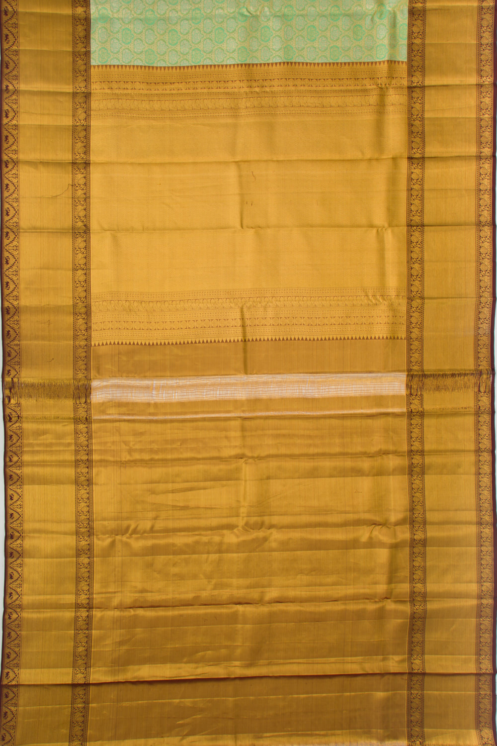 Taranga Kanchi Silk Tissue Brocade Green Saree