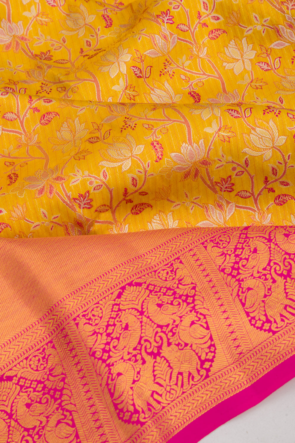 Taranga Kanchi Silk Tissue Jaal Yellow Saree