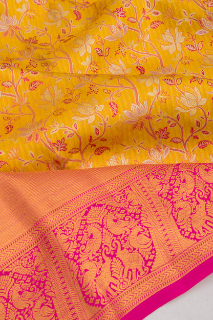 Taranga Kanchi Silk Tissue Jaal Yellow Saree