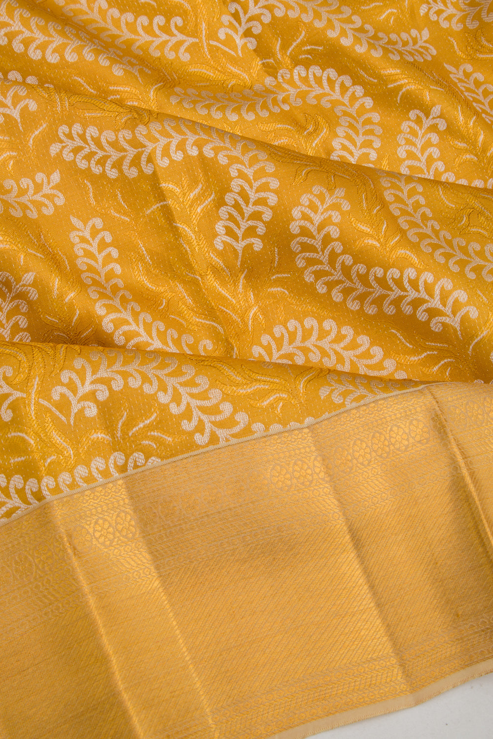 Taranga Kanchi Silk Tissue Brocade Gold Saree