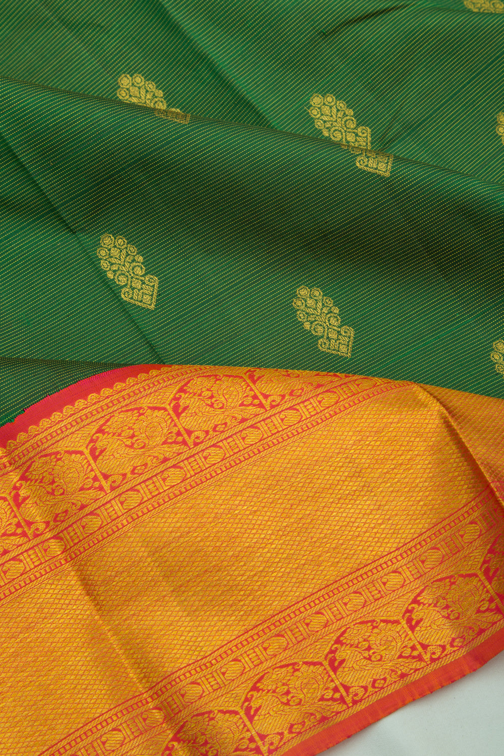 Kanchipuram Silk Oosi Lines and Butta Green Saree