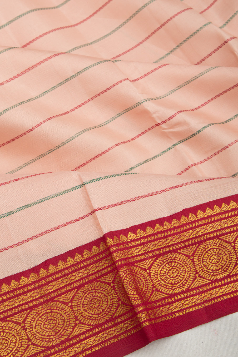 Kanchipuram Silk Horizontal Lines Peach Saree With Ganga Jamuna Border