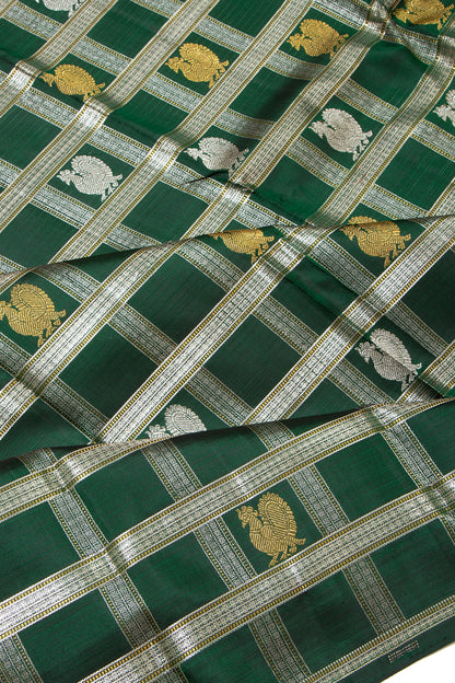 Kanchipuram Silk Checks And Butta Bottle Green Saree