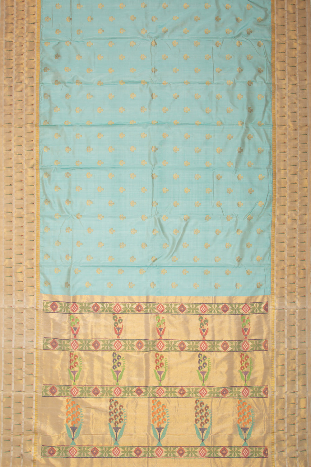Kanchipuram Silk Butta Pastel Blue Saree With Triple Muniya Border And Ikat Blouse
