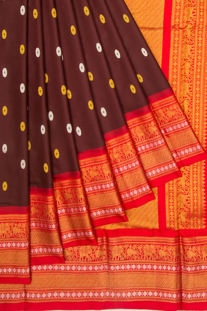 Kanchipuram Silk Twill And Butta Brown Saree With Ikat Blouse