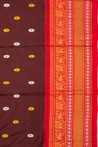 Kanchipuram Silk Twill And Butta Brown Saree With Ikat Blouse