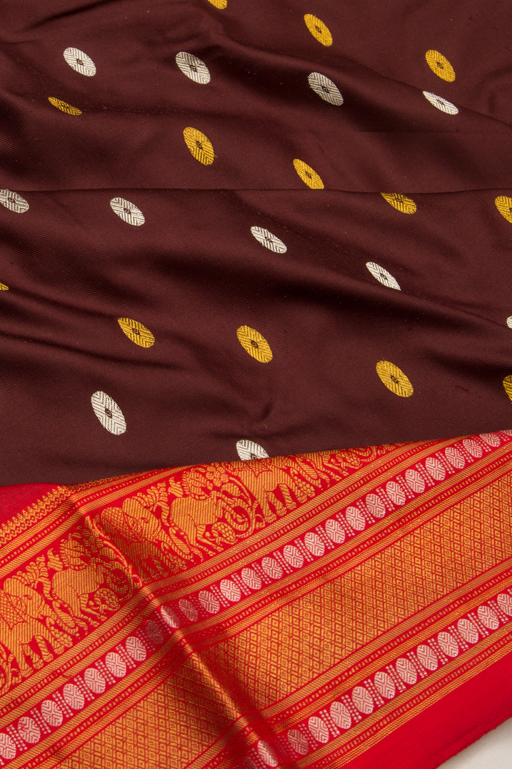 Kanchipuram Silk Twill And Butta Brown Saree With Ikat Blouse