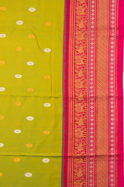 Kanchipuram Silk Twill And Butta Green Saree With Ikat Blouse