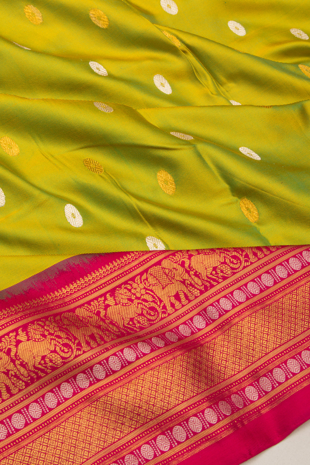 Kanchipuram Silk Twill And Butta Green Saree With Ikat Blouse