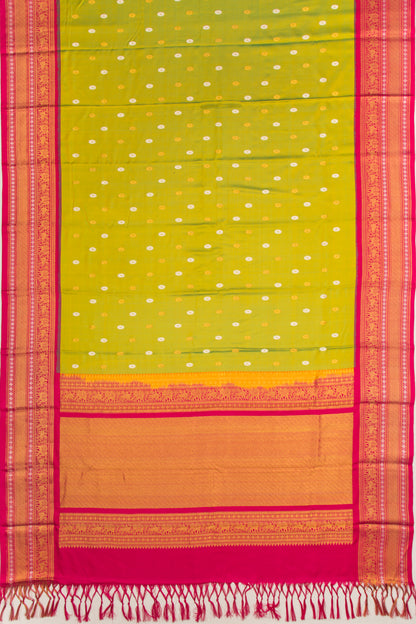 Kanchipuram Silk Twill And Butta Green Saree With Ikat Blouse