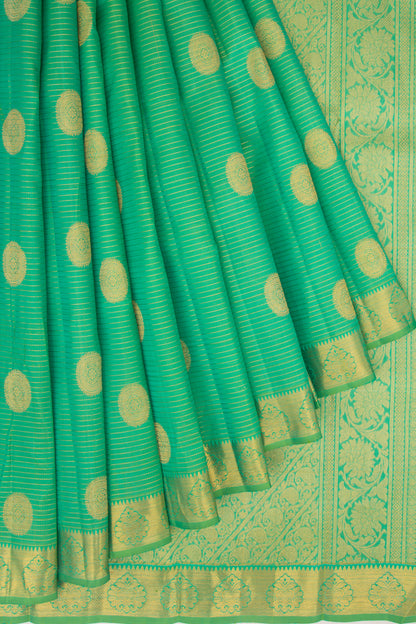 Kanchipuram Silk Oosi Lines And Butta Green Saree