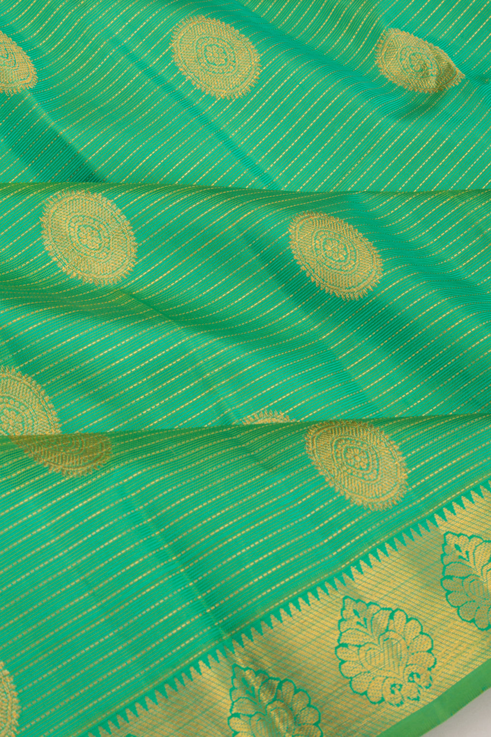 Kanchipuram Silk Oosi Lines And Butta Green Saree