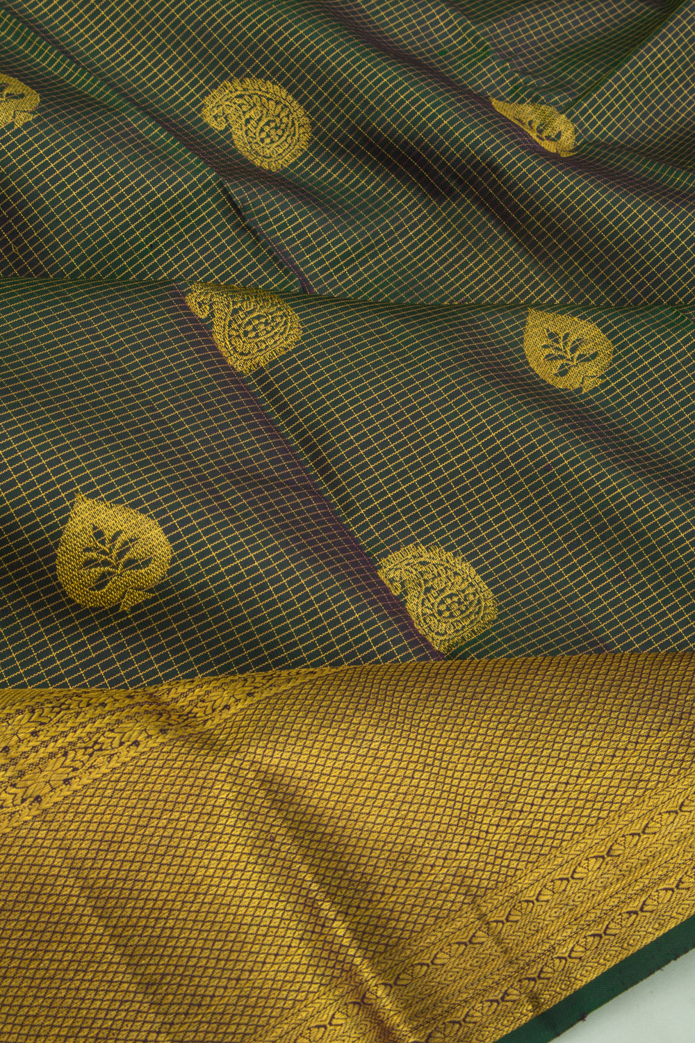 Kanchipuram Silk Checks And Butta Dark Green Saree