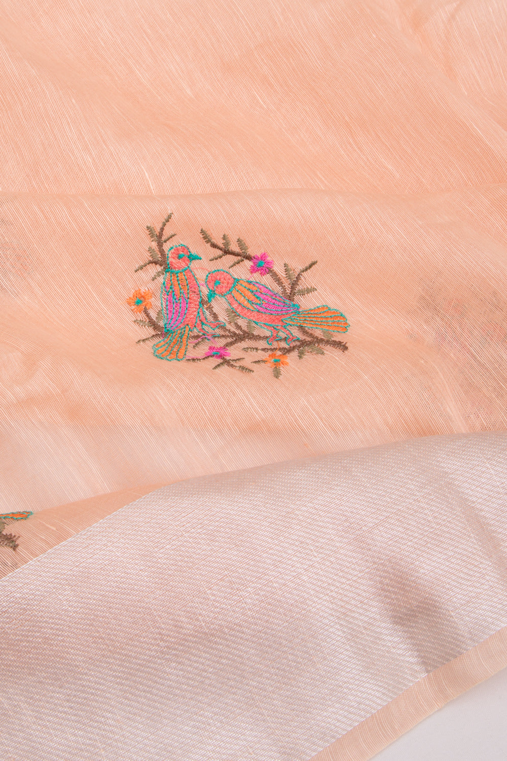 Linen Floral Embroidery Pastel Orange Saree