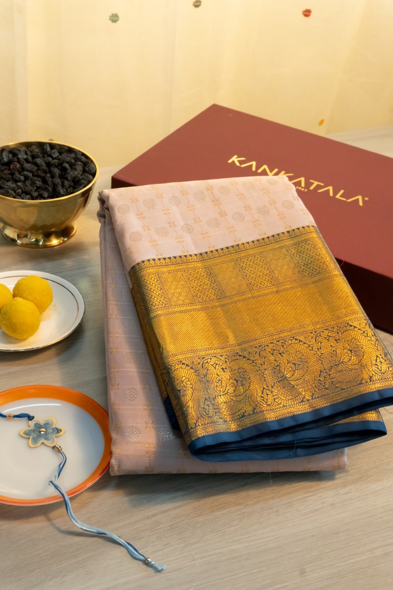 Kanchipuram Silk Tissue Checks And Butta Silver Saree With Gift Box And Rakhi